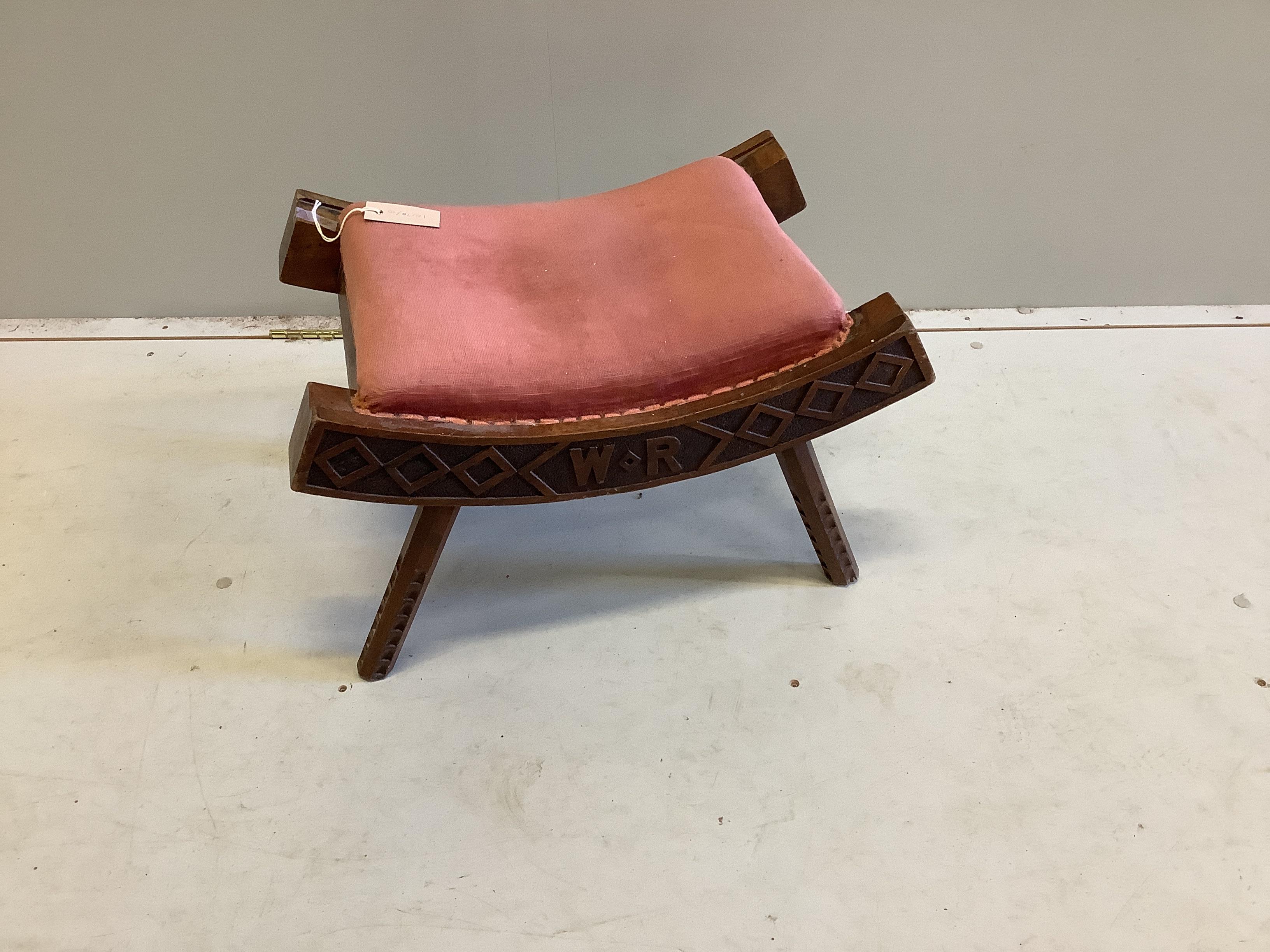 A Liberty chip carved stool, dated 1893, width 56cm, height 34cm